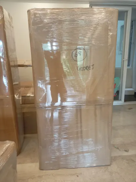 Glass-front cabinet packed for moving