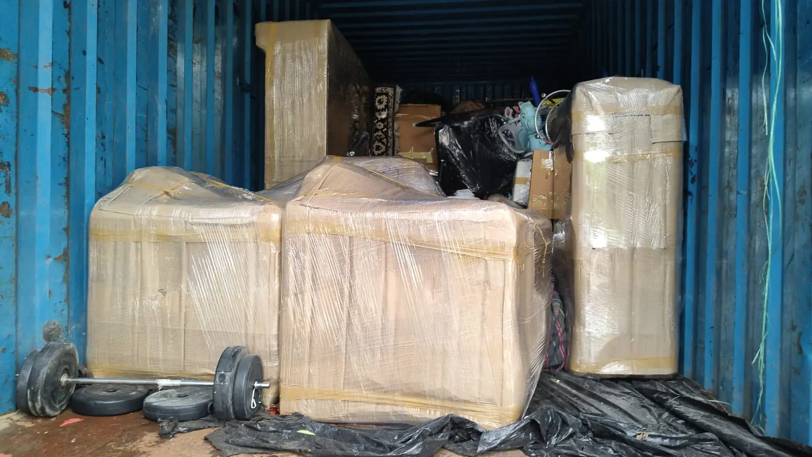 Closed container truck loaded by Dev International in Agra